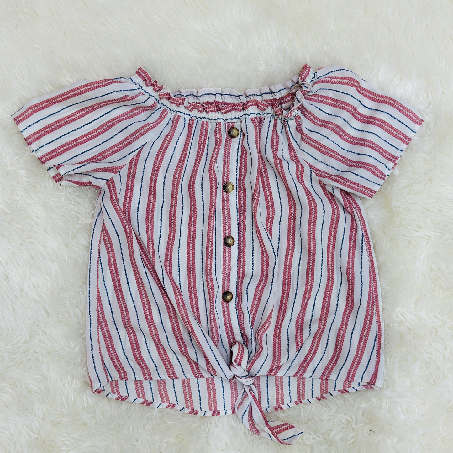 Camisa escotada de niña